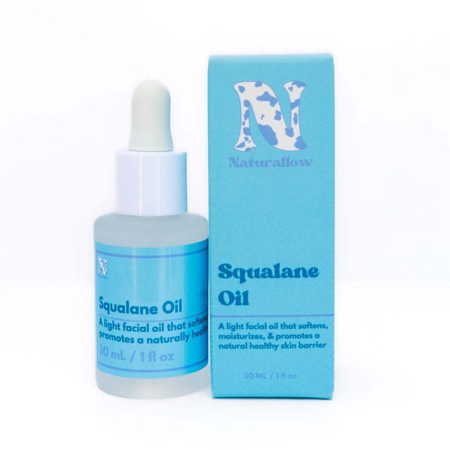 Naturallow's Organic Squalane Oil bottle and box sitting next to each other against a white background