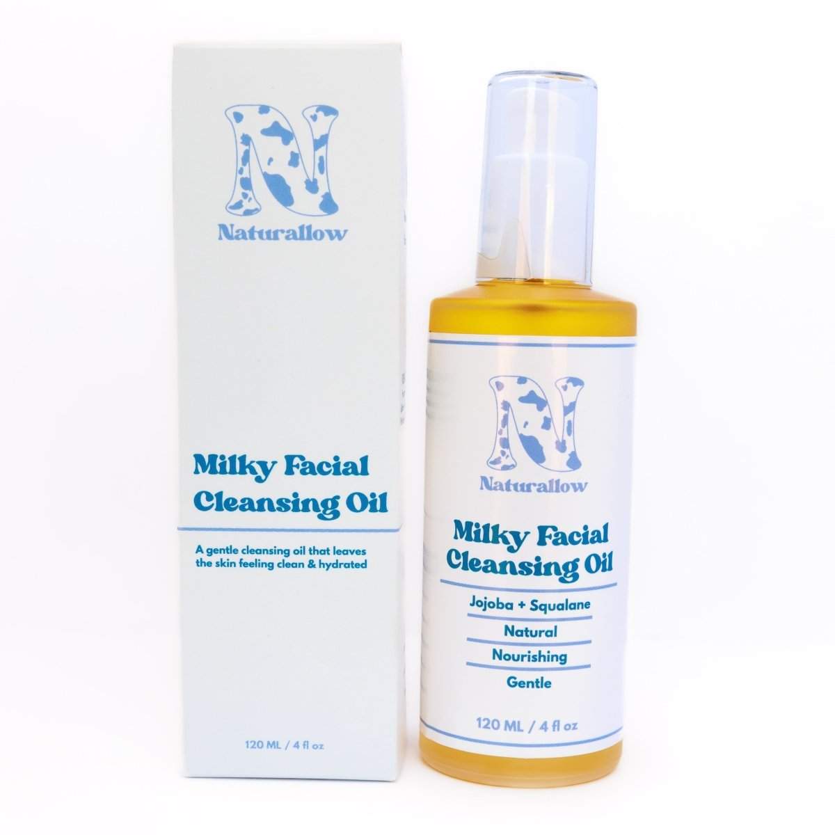Naturallow's Milky Facial Cleansing Oil bottle and box standing next to each other against a white background