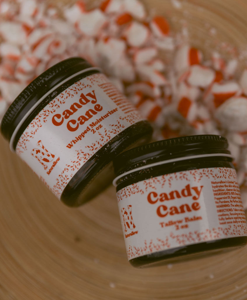Naturallow Limited Edition Candy Cane Moisturizers on a bed of crushed peppermint - cropped version