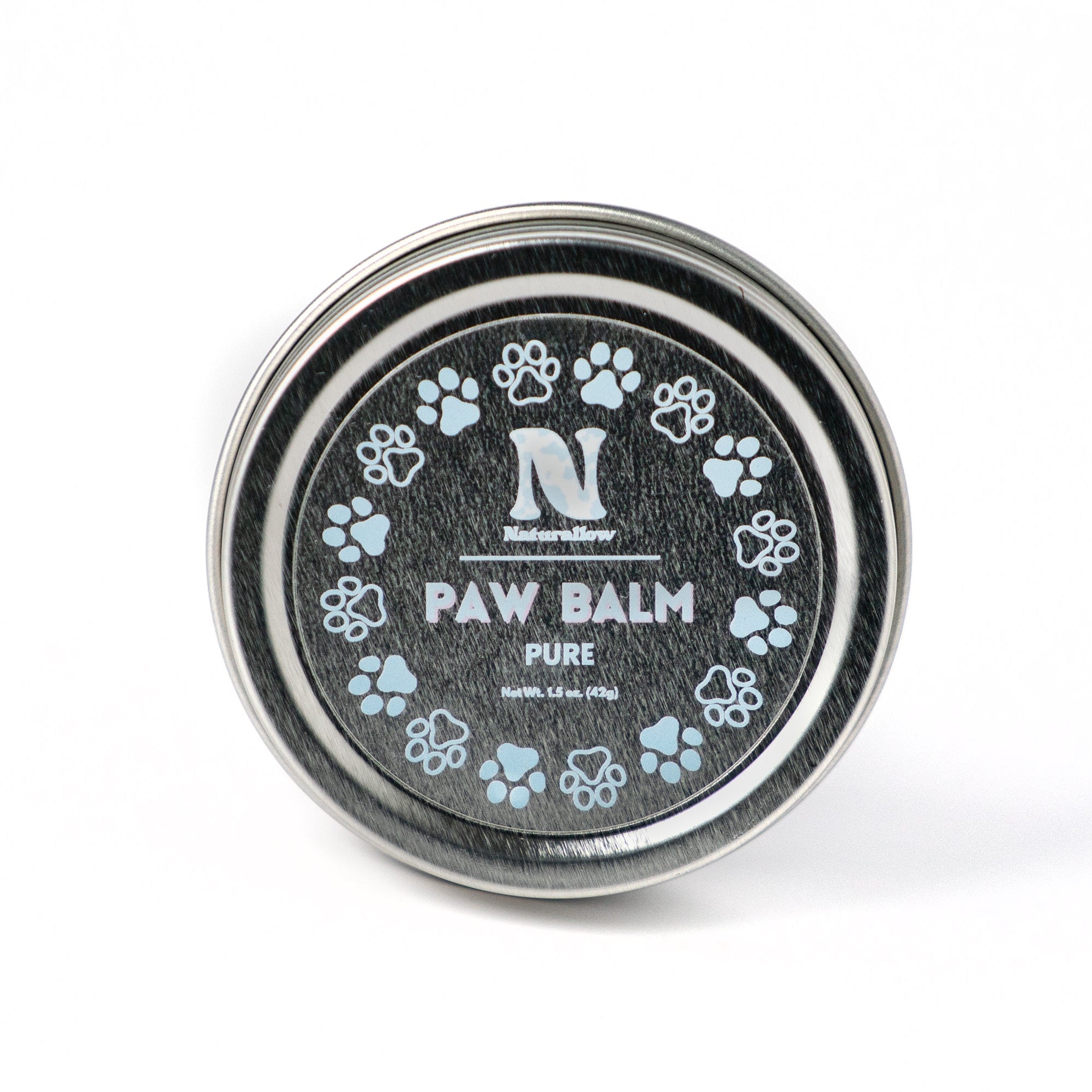 A photo of a small, circular tin with light blue paw print illustrations. Its label reads "Naturallow Paw Balm Pure. Net Weight 1.5 oz (42g)"