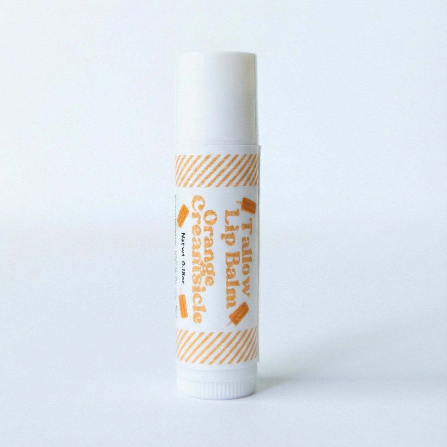 Naturallow's Limited Edition Orange Creamsicle Tallow Lip Balm on a white background