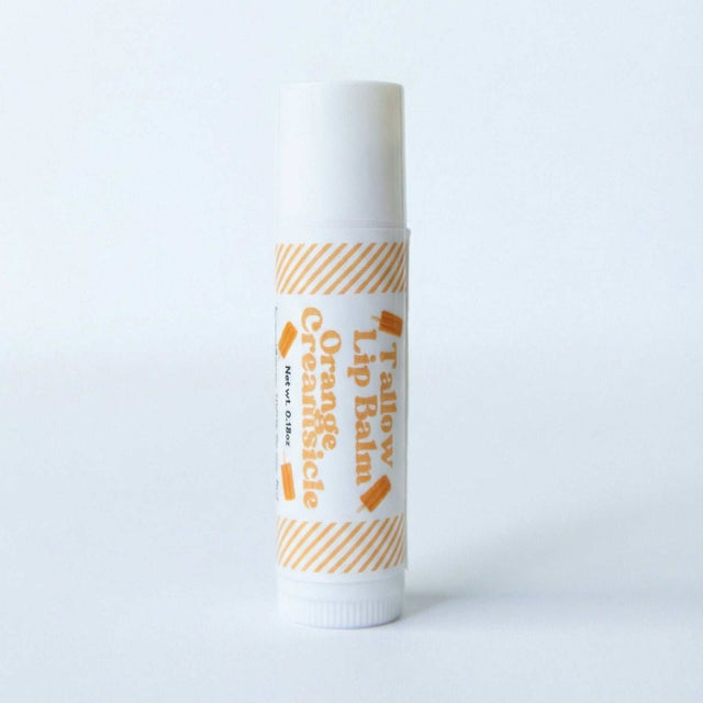 Naturallow's Limited Edition Orange Creamsicle Tallow Lip Balm on a white background