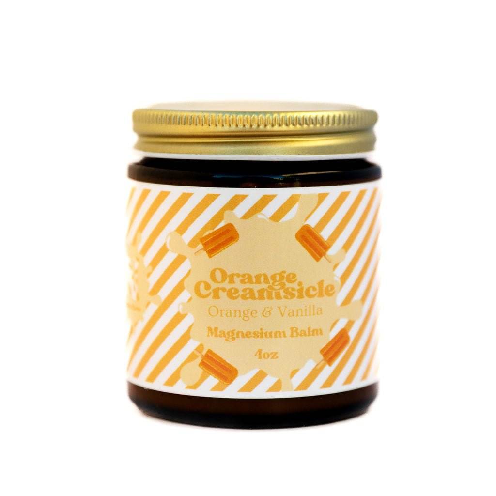 Naturallow's Limited Edition Orange Creamsicle Tallow Magnesium Balm jar on a white background