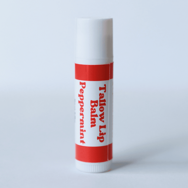 Naturallow's Peppermint Tallow Lip Balm Standing against a White Background