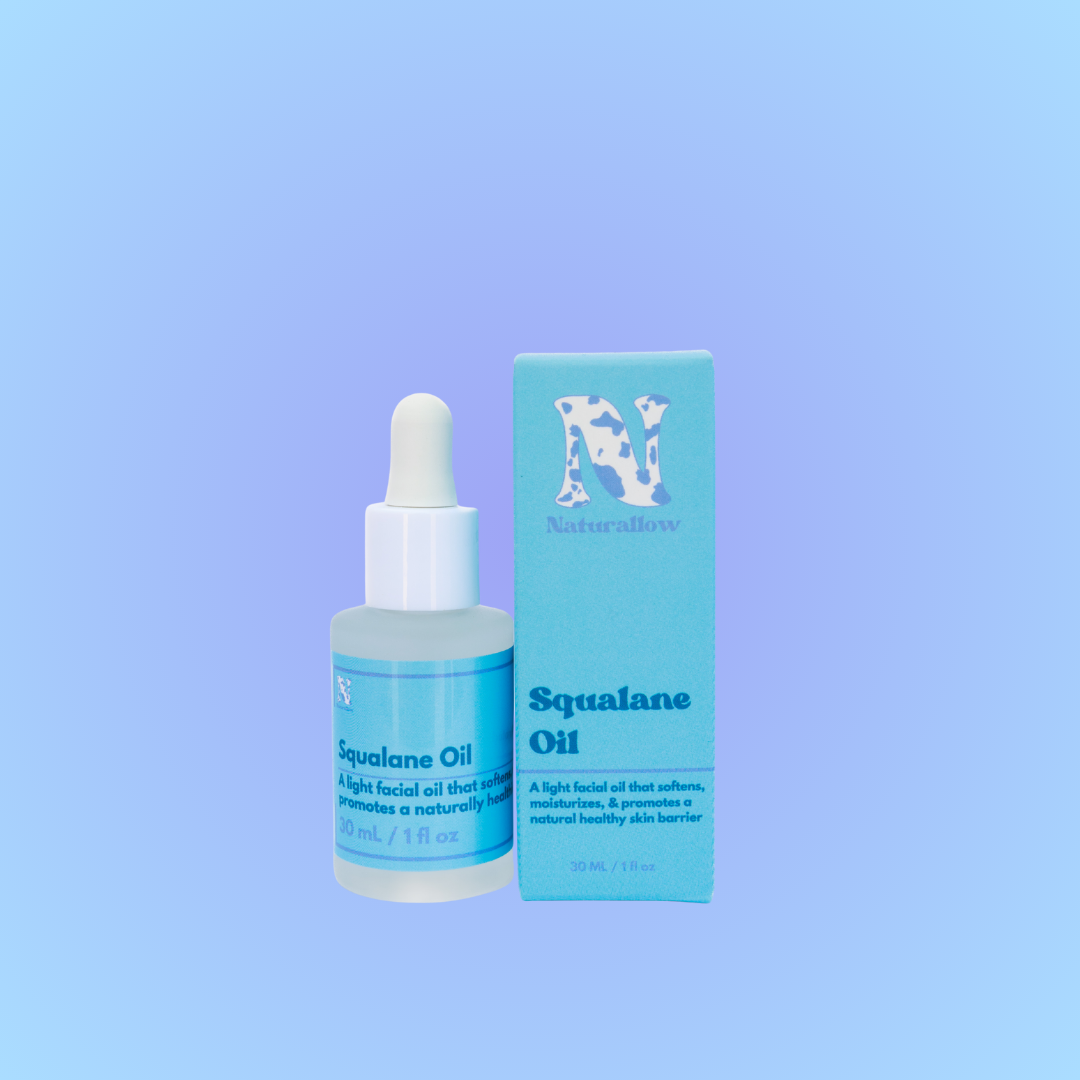 Squalane oil bottle and packaging on a blue gradient background